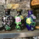A Lot of three Chinese floral and bird design cloisonne vases.