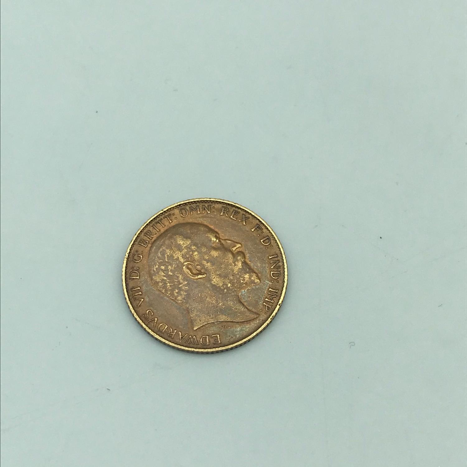 A Gold 1909 half sovereign coin. - Image 2 of 2