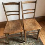 A Pair of early 1900's chairs designed with floral design bases.