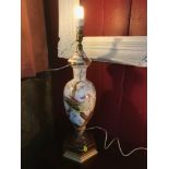 A Large Antique porcelain hand painted table lamp, depicting two birds. Measures 68cm in height.
