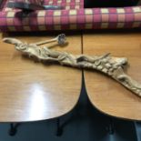 A Piece of drift wood with hand carved lizards. Measures 79cm in length