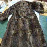 A Ladies vintage fur coat.
