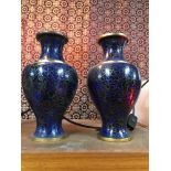 A Pair of Chinese blue and gilt cloisonne vases.
