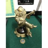 Antique Art Deco Pierrot figurine. Made from bronzed spelter and faux ivory fave and hands. Measures