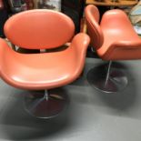 A Pair of Artifort Tulip Pierre Paulin leather and chrome swivel chairs.