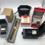 A Lot of various ladies watches which includes Erickson Beamon watch, Two Guess watches, DKNY
