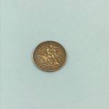 A Gold 1909 half sovereign coin.