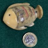 Antique Japanese hand carved netsuke of a fish, Signed by the artist, Also shows lovely details.