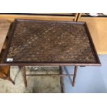 Antique occasional folding table, designed with bamboo effect legs and weaved top. Measures