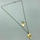 A 9ct gold unusual necklace together with two 9ct gold pendants. Total Weight 8.03grams