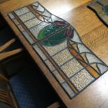 A Lot of two Antique stain glass panels (two sections) Each section measures 38.5x46.5cm