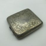 A Birmingham silver cigarette case with detailed engraving.