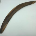 Antique late 19th early 20th century aborigine boomerang, showing various markings. Measures 57cm in