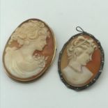 A Lot of two Antique carved cameo's, The large one is encased in a 9ct gold casing and the other