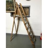 A Pair of vintage "A" frame ladders.