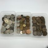 Three tubs containing a quantity of mixed British coins, which includes one pennies, Three