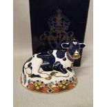 Royal Crown Derby Friesian cow "Buttercup" paperweight with gold button and box