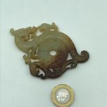 A Finely carved Jade Chinese dragon token sculpture.
