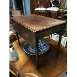 A Victorian Pembroke table, with single pull out drawer & key