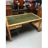 A Retro Rustic style Invictus two drawer desk with green leather top.