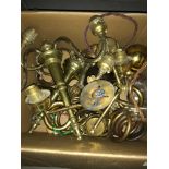 A Box of vintage wall light fittings and vintage curtain pole hoops and bobbles.
