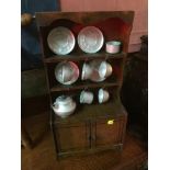 A Mid century Apprentice piece dresser with metal tea set. Measures 51x26.5x13cm