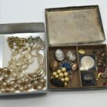 A Selection of vintage and antique jewellery which includes Art Deco Grape design brooch, two carved