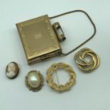 A Ladies vintage KGU Compact/ cigarette case, Two Monet brooches, Gilt metal and carved cameo brooch