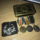 A Lot of WW1 Medals, Christmas tin and Cap badge, WW1 War and Victory medals to 3027 PTE. J. FALCO
