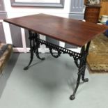 A Heavy cast iron base, solid Georgian Mahogany top table, Ideal for kitchen table/ side table.