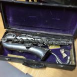 Antique plated saxophone with travel case.