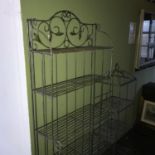 A Rustic 5 tier cast metal folding shelving unit together with a 3 tier shelving unit
