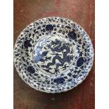A Chinese porcelain large blue & white bowl with dragon design