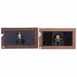 2 Magic Lantern Skeleton Slipping Slides, c. 1870-80Unmarked. Wood frame 4 x 7 in., hand-colored.