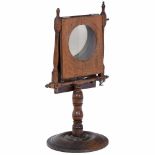 L'Optique Zograscope, c. 1880Height 21 ¼ in., tropical wood, wormholes, lens dia meter 5 in., for