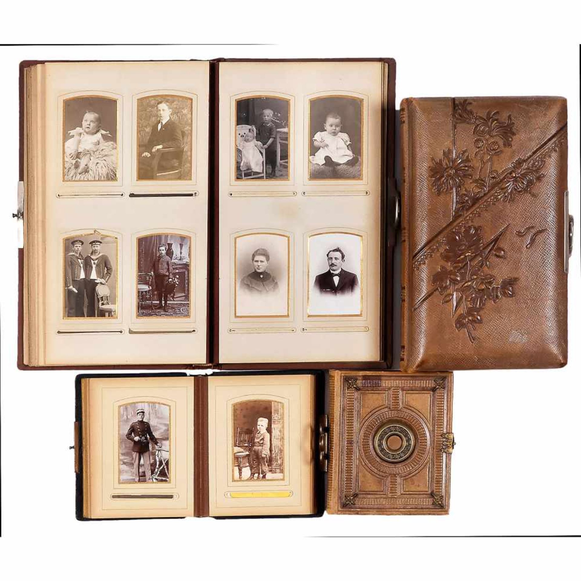 4 Leather-Bound Photographic Albums, late 19th CenturyWith decorative mounts, embossed covers,