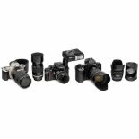 Professional Nikon and Canon Cameras1) Nikon F3 HP, no. 1846759, with Nikon Speedlite SB-17. Lenses: