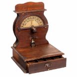 The Eagle Cash Register, c. 1870Very early American wood dial-type cash register, probably made by