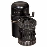 Curta Type II Calculator (Black), 1955Curt Herzstark, Liechtenstein. With original tin case.