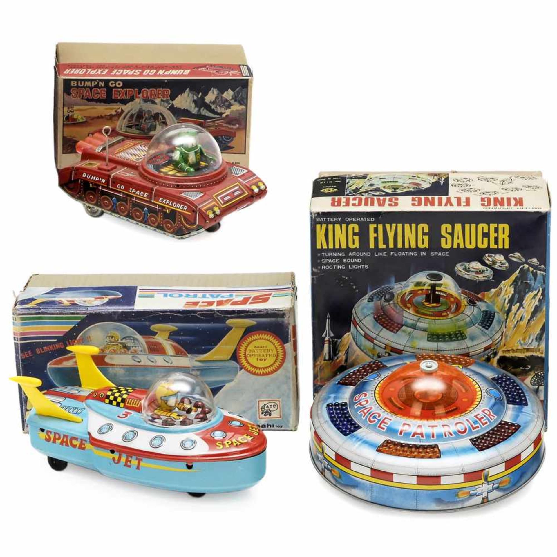 3 Japanese Space Toys, c. 1965Lithographed tin and plastic. 1) Bump'n go Space Explorer, Yoshiya K.