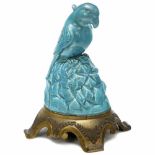 Andia Parrot Radio Loudspeaker, 1924By Doulton & Co. for Artandia Ltd. Turquoise pottery parrot with