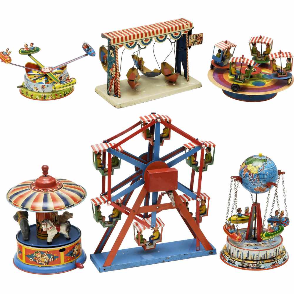 6 Lithographed Tin Toy Fairground Carousels, c. 1950-601) Blomer & Schüler, flying rockets no.