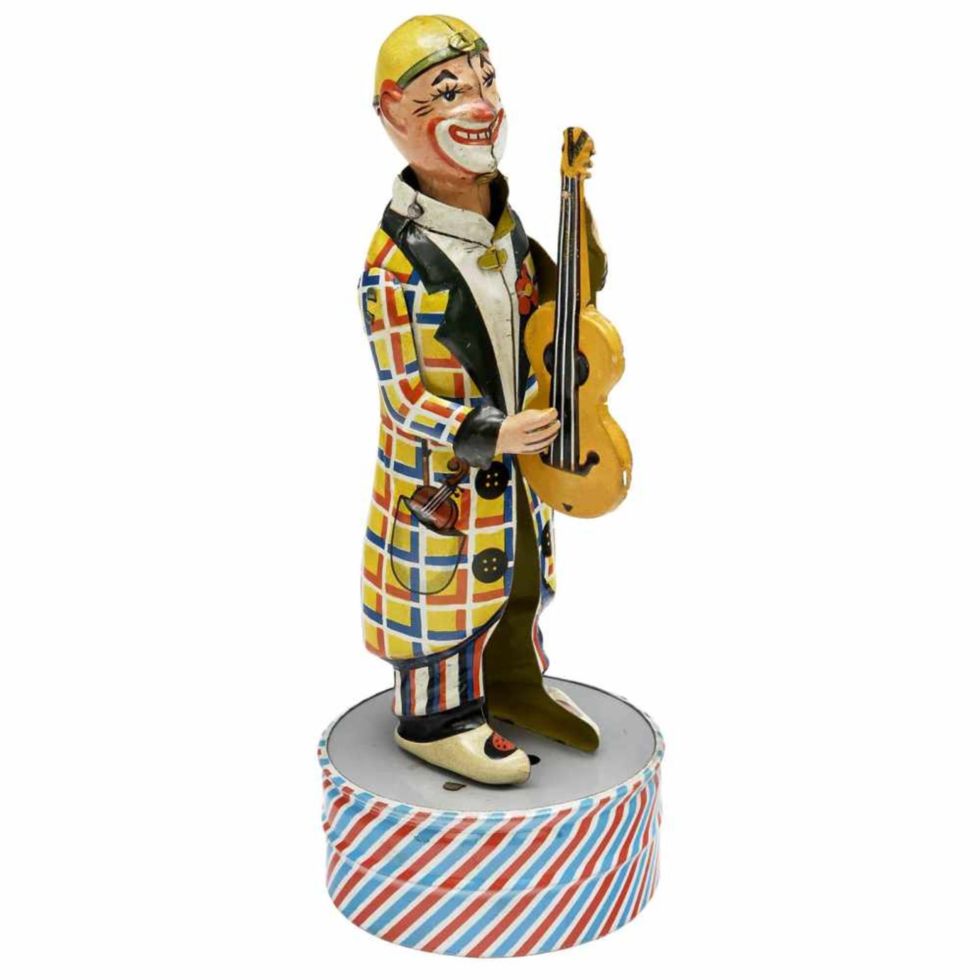 Clown by Distler, c. 1955Johann Distler, Nuremberg. Lithographed tin, spring-driven (working),