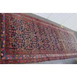 A North West Persian rug, 150 x 410cm