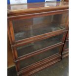 A Globe Wernicke three section oak bookcase with makers label 112.5cm high, 86cm wide