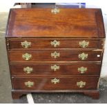 A George III mahogany bureau, the fall front enclosing a fitted interior, splits and losses, 102cm