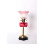 Cranberry glass paraffin lamp, with chimney and etched shade (height 65cm)