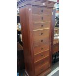 A mahogany Wellington type chest with drawers and drop down leather lined writing surface 158cm