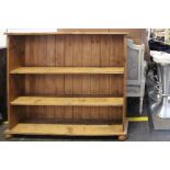 A set of pine book shelves 125cm wide