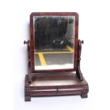 A William IV mahogany toilet mirror with two concave drawers 69cm high, 54cm wide